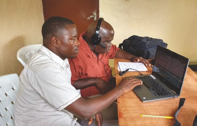 A recording in process. Image extracted from the 2018 Faith Comes By Hearing Impact Report